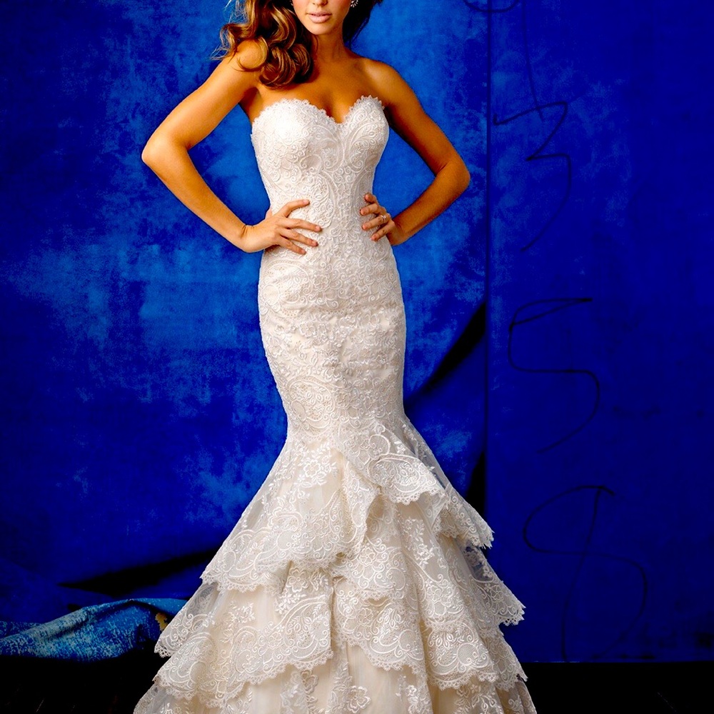 Allure fit and flare strapless gown, never even tried on.LT/Gold/Ivory/Silver